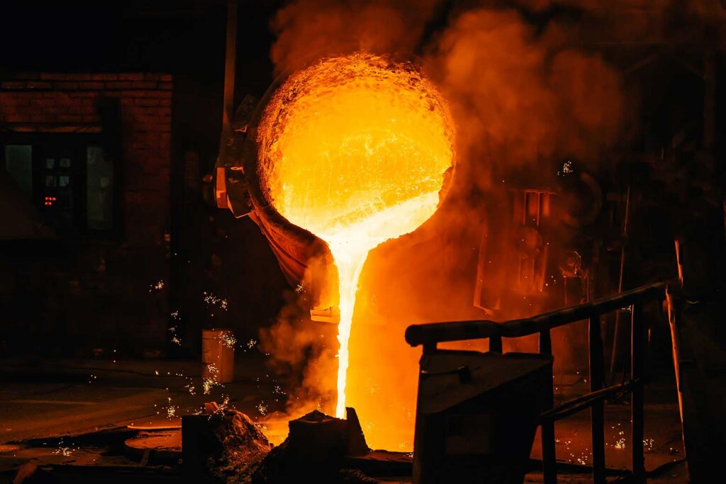 molten metal being poured into metal castings